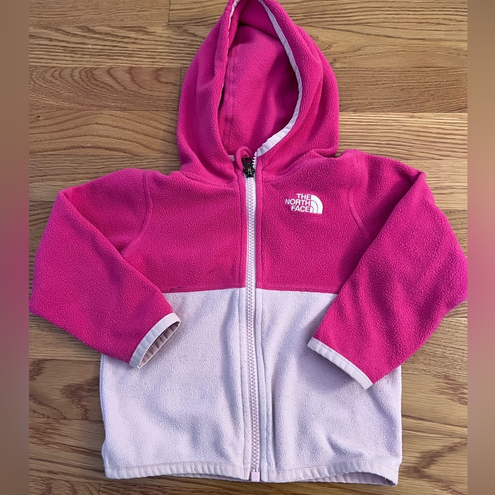 The North Face girls fleece zip up sweater with hood.